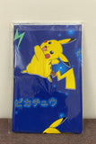 Baby Changing Sheet Pikachu Wrapper Against Textured Wall